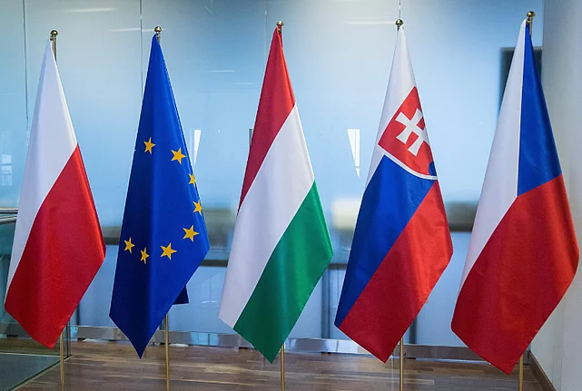 The flags of Poland, the EU, Czechia, Hungary and Slovakia.