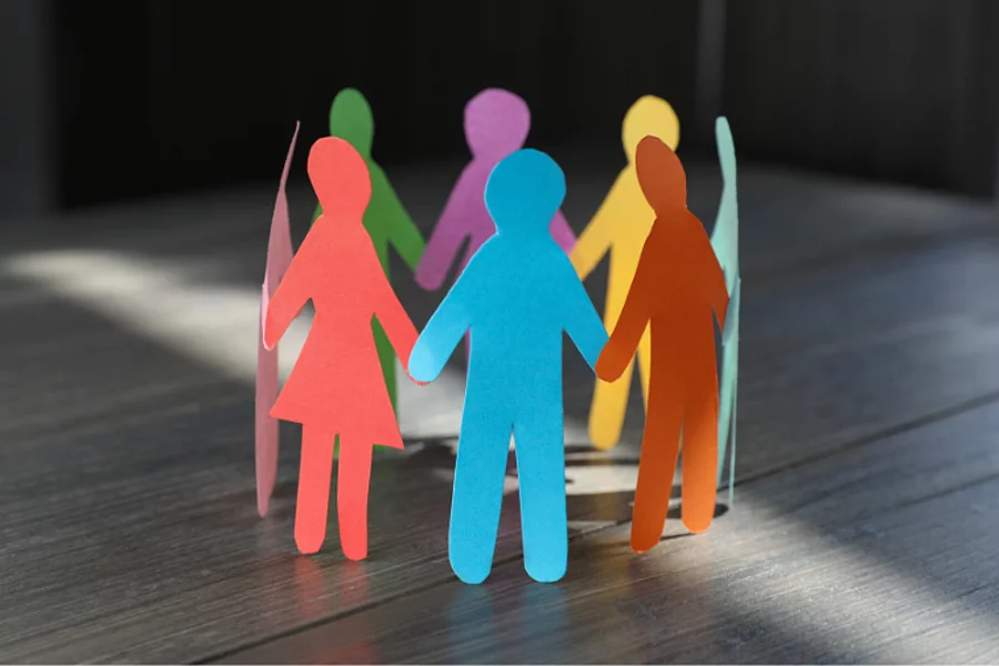 A paper chain of humans holding hands.