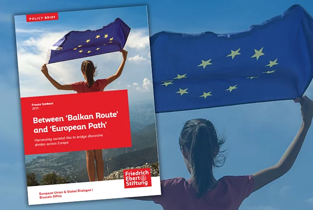 Young woman holding an EU flag