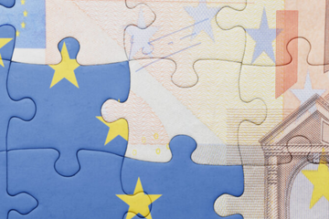 A puzzle depicting an EU flag and a 50 Euro note.