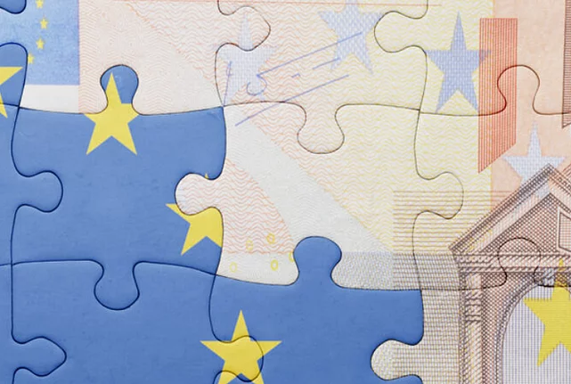A puzzle depicting an EU flag and a 50 Euro note.