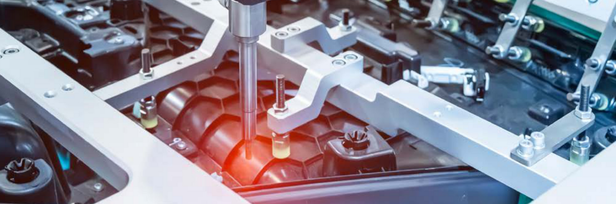 A robotic arm at an assembly line.