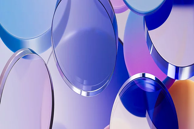 Colourful glass lenses overlapping (abstract image).