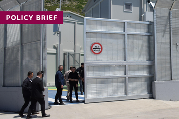 A fenced facility at the external European border.