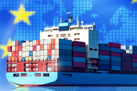 A cargo ship with an EU flag in the background.