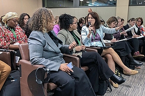 Ann Linde speaking at a Paris conference.